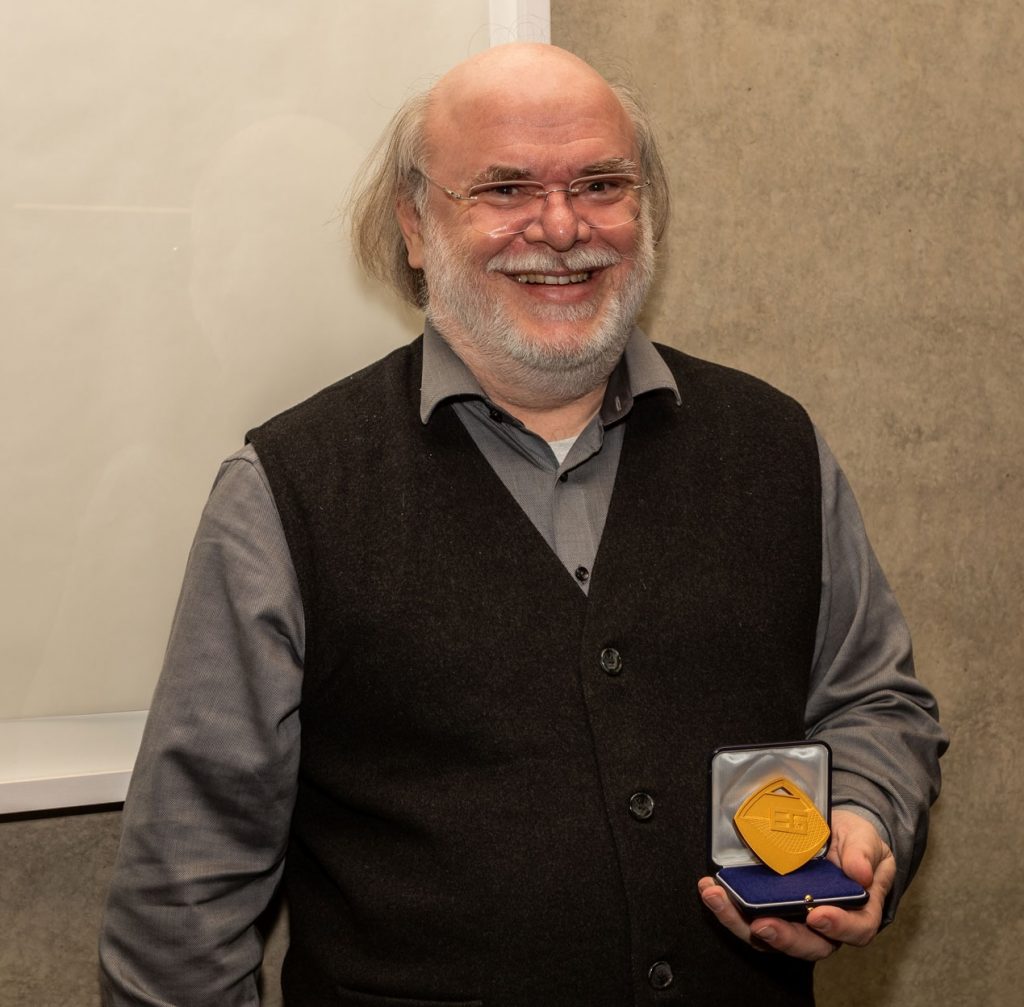Photo showing Philipp Slusallek with the EG Medal