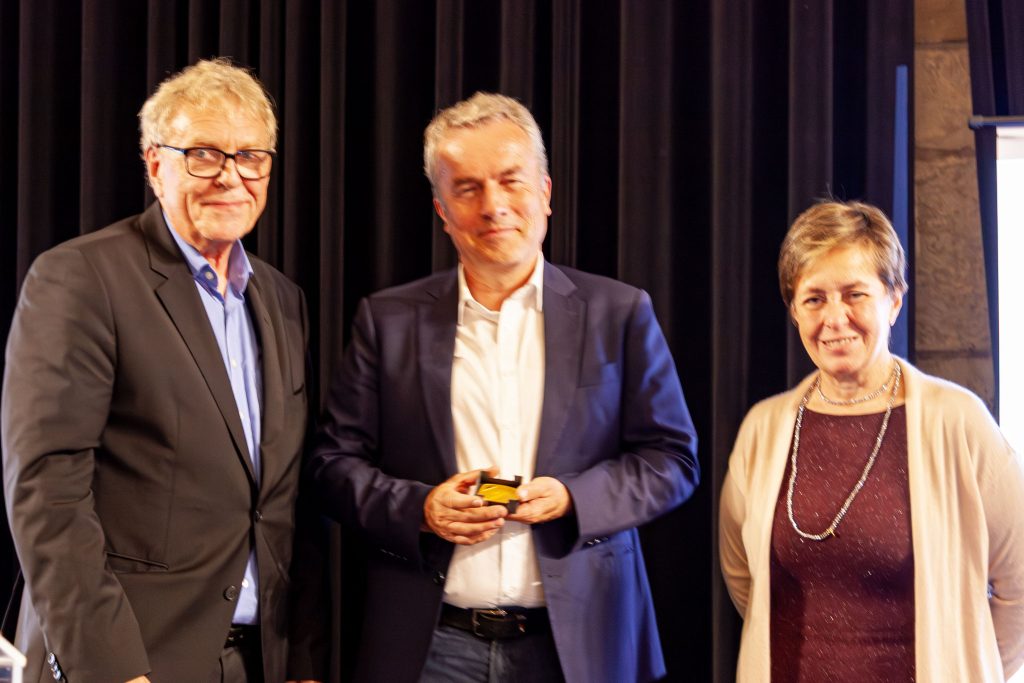 Photo from the EG 2026 award ceremony showing Oliver Deussen receiving the Eurographics Gold Medal