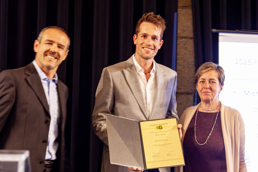 Photo from the EG 2026 award ceremony showing Michael Fischer receiving the Eurographics PhD Award