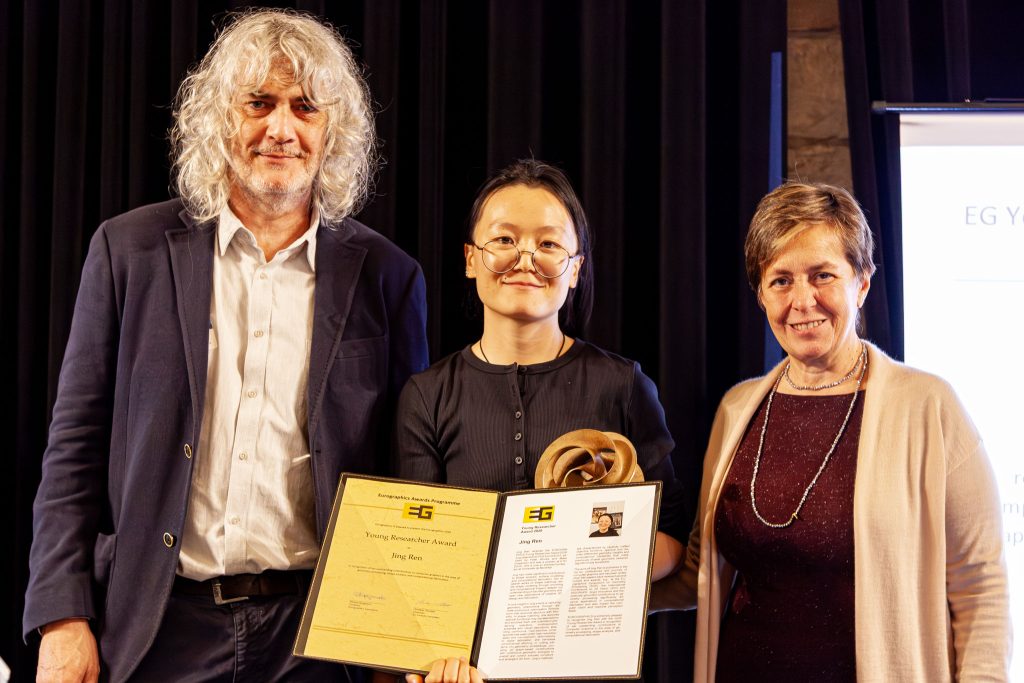 Photo from the EG 2026 award ceremony showing Jing Ren receiving the EG Young Researcher Award