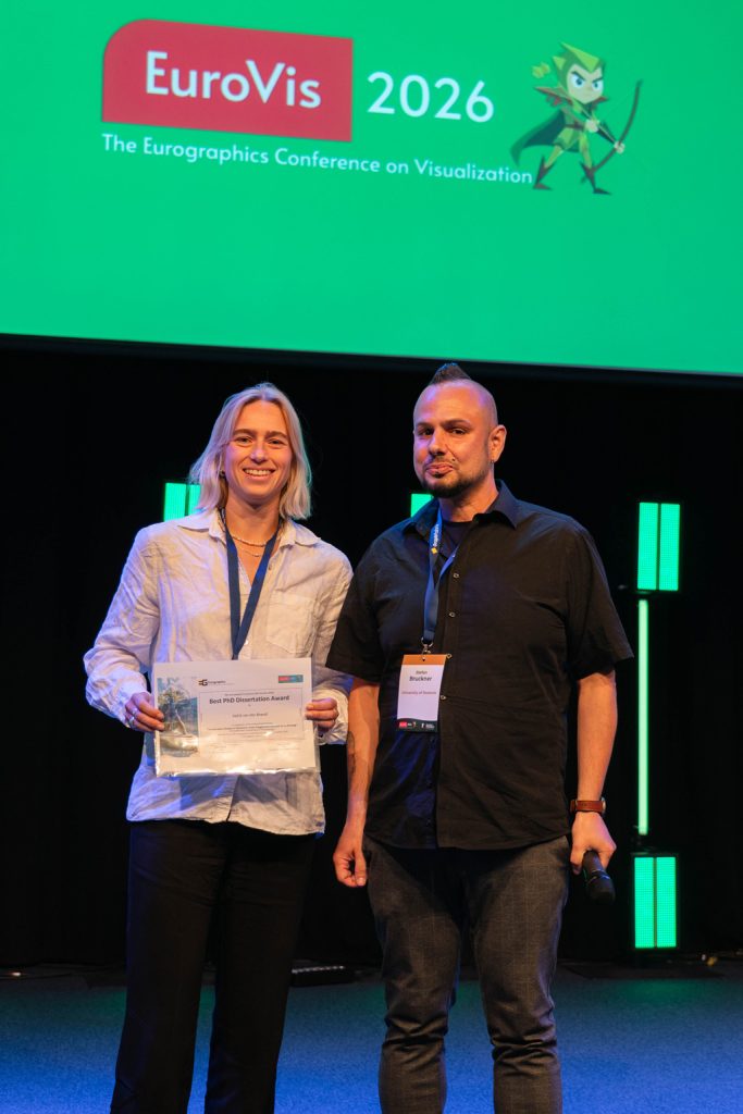 EuroVis 2026 PhD Awardee Astrid van den Brandt with chair Stefan Bruckner
